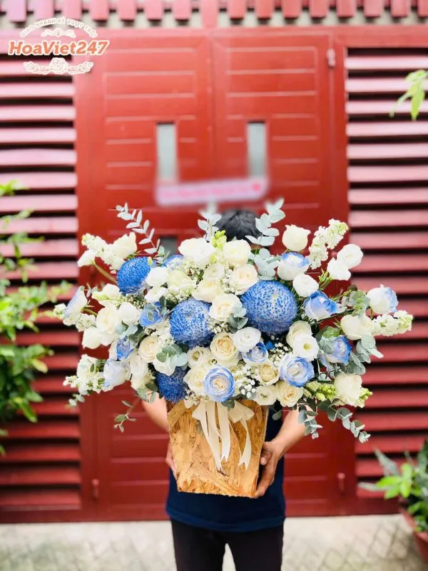 Giỏ hoa tông xanh tặng cán bộ công an